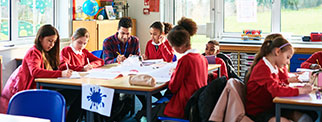 Group of young students in a classroom environment